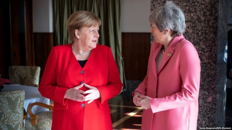 May dhe Merkel bisedojnë për Brexit-in