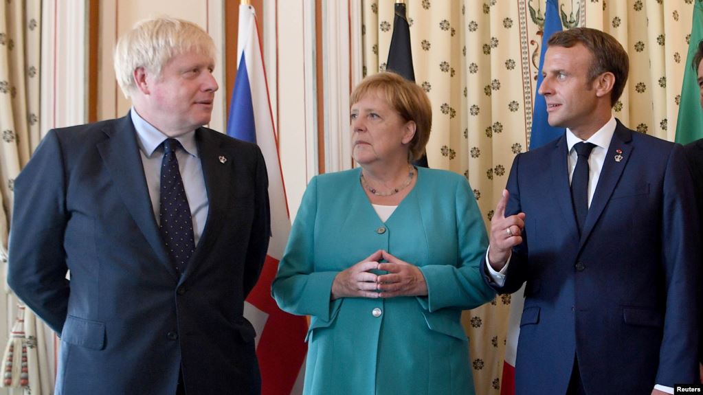 Johnson, Macron dhe Merkel thirrje për të zbutur tensionet